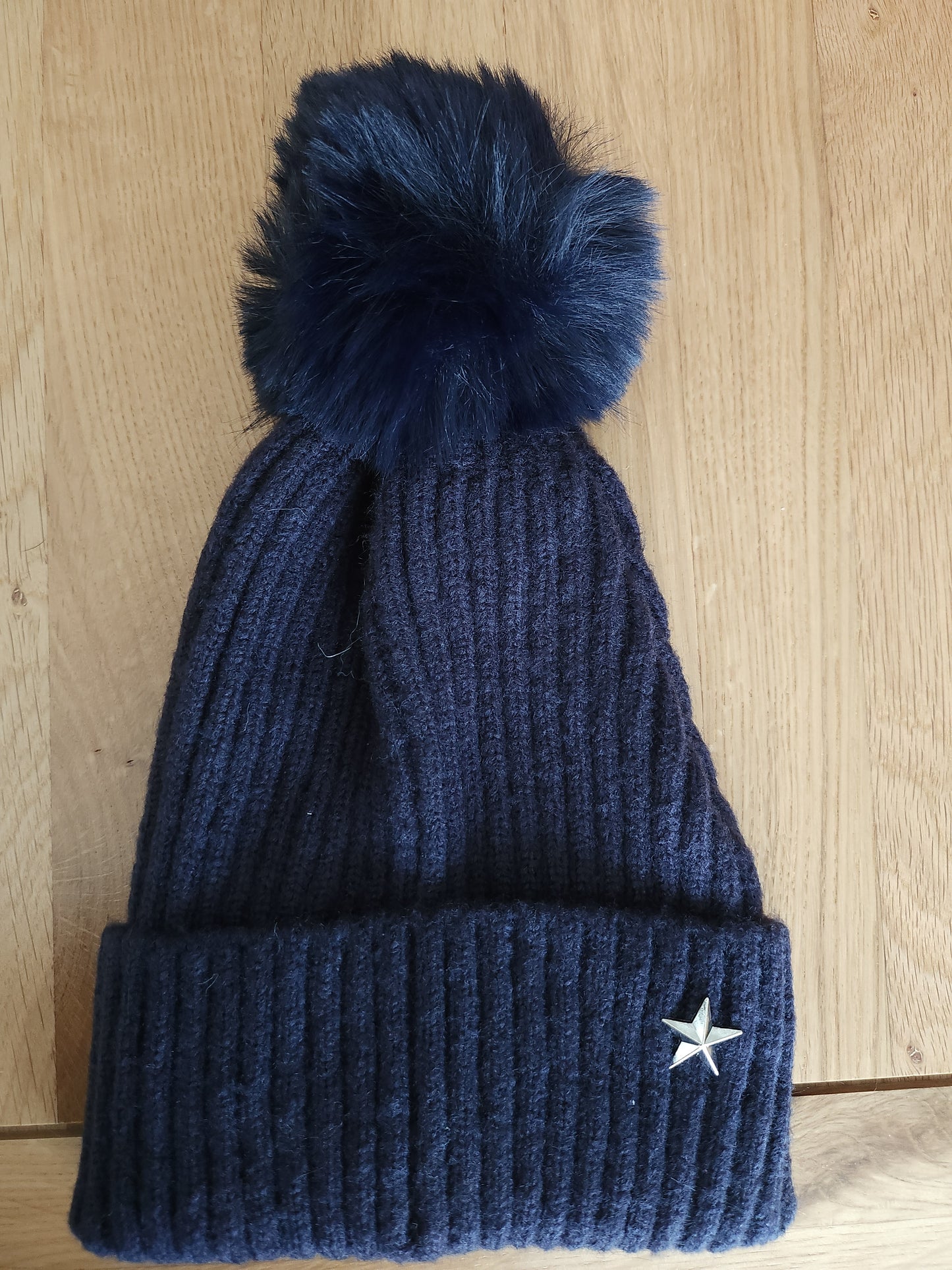Navy star bobble hat
