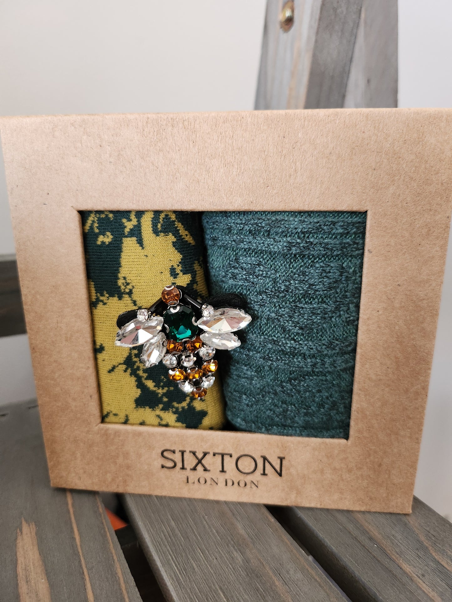 Teal Duo socks with queen bee brooch
