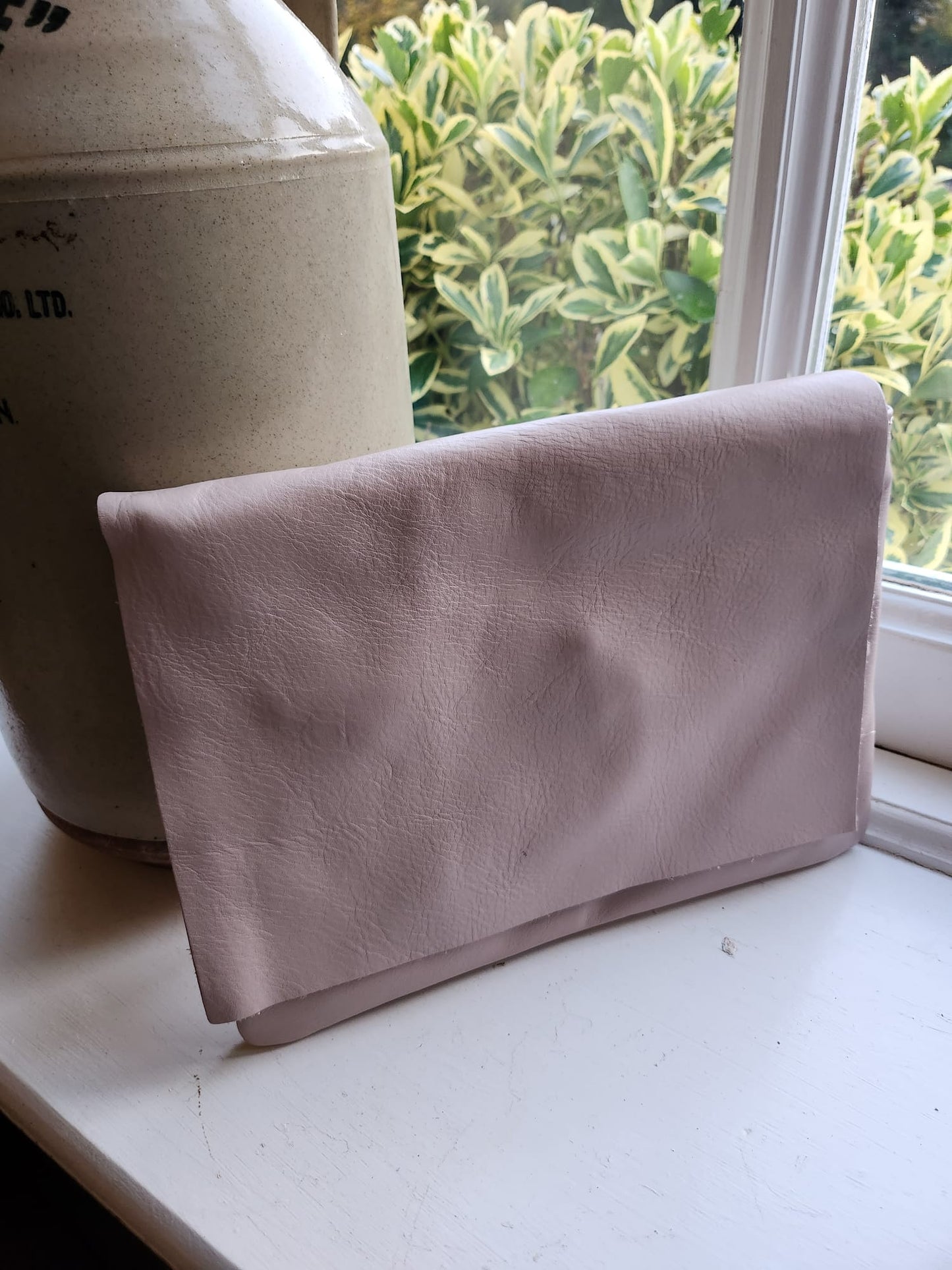 nude crossbody handbag